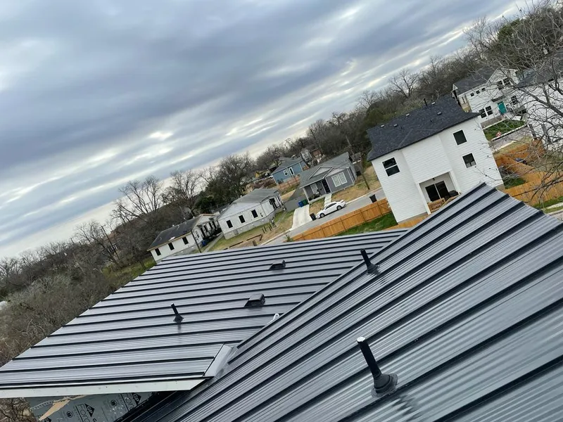 Standing seam metal roof panels with vents for Skylight Repair in Waco